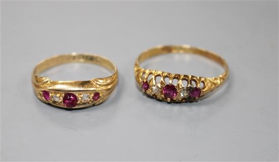 Two early 20th century 18ct gold, ruby and diamond set dress rings,